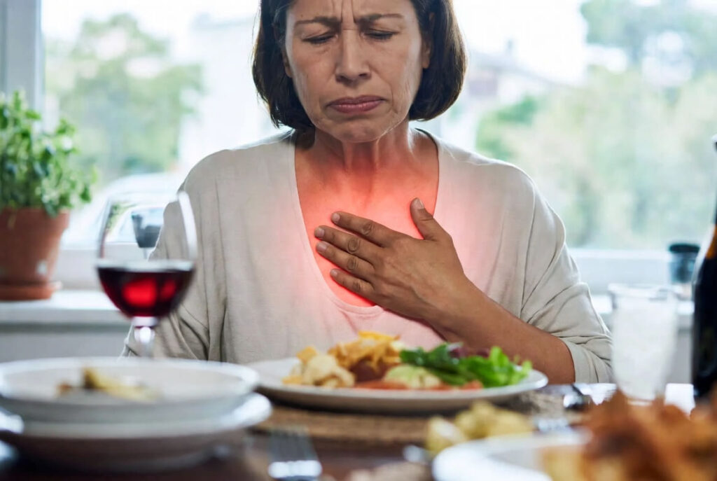 Donna con reflusso gastroesofageo